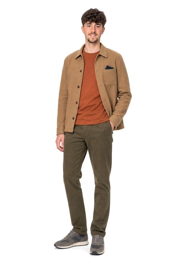 A rust t-shirt under a camel jacket with khaki chinos, for town and errands.