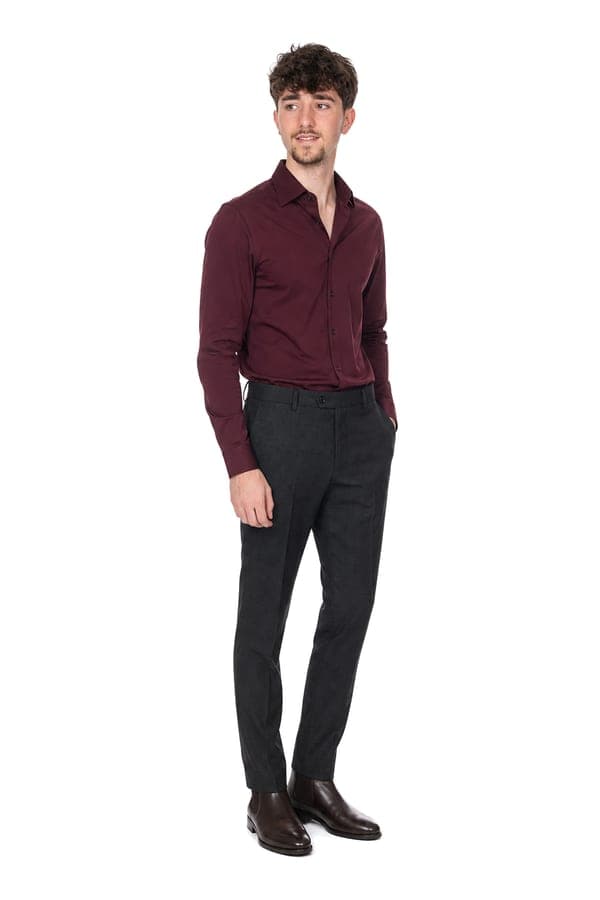 A wine shirt with charcoal trousers and chocolate boots, for dinner out.